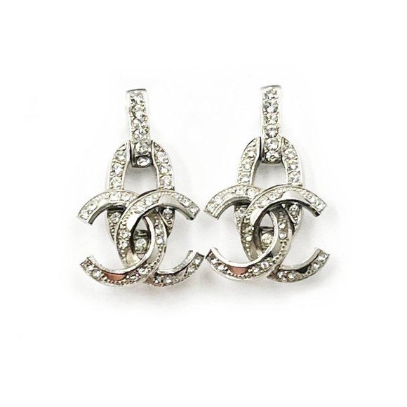 CHANEL Jewelry - Chanel Silver Lock CC Crystal Piercing Earrings